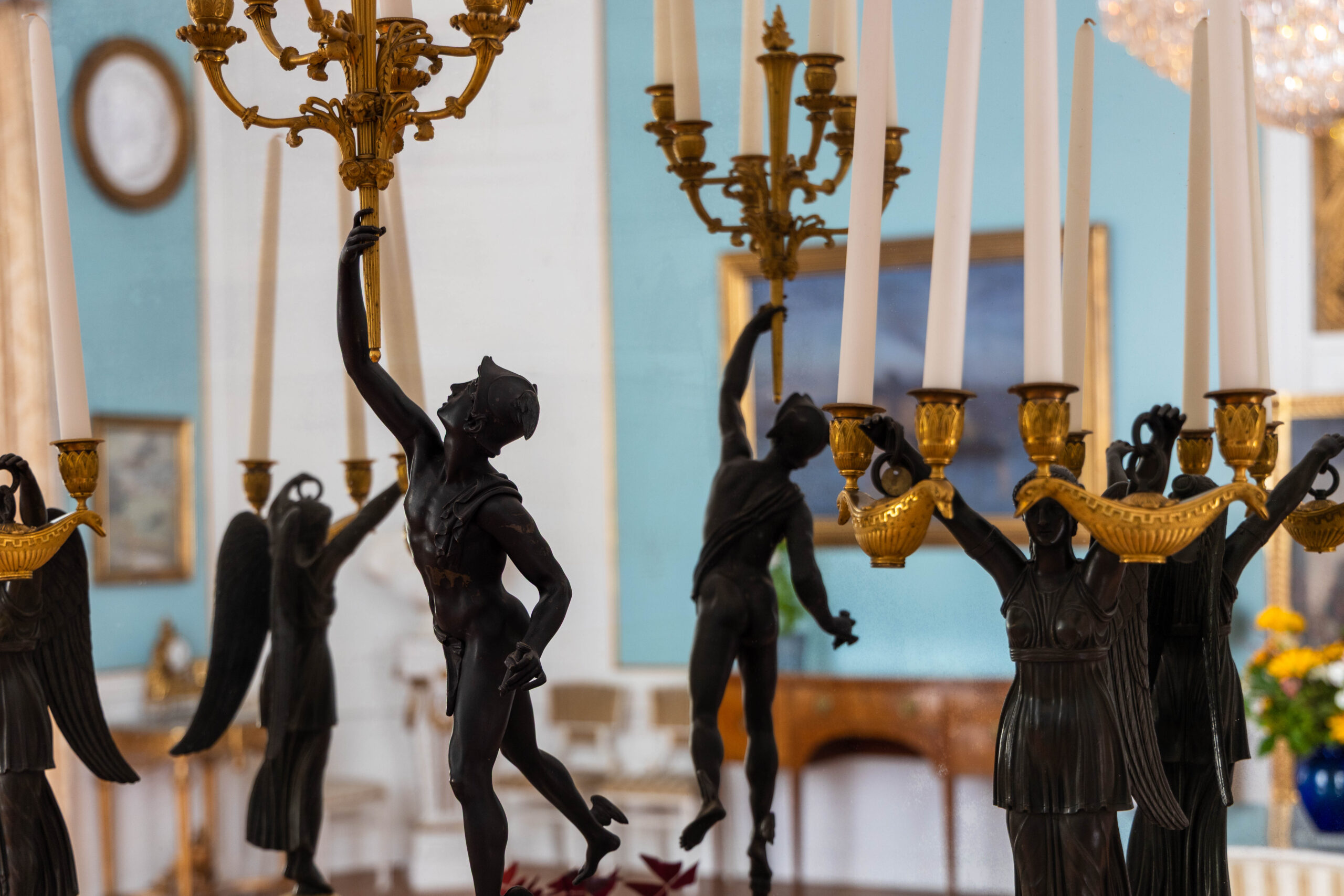 Prins Eugen's Waldemarsudde Photo of chandeliers looking like statues in front a mirror.